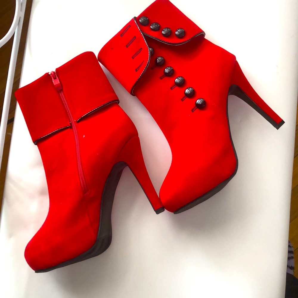Wish, Crimson Red with Black buttons and a zipper on the side.  4 in heels.